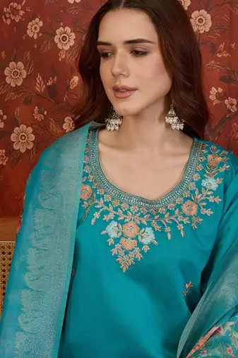 Blue silk blend embroidered kurta set with dupatta.