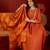 Orange cotton silk embroidered kurta set with dupatta.