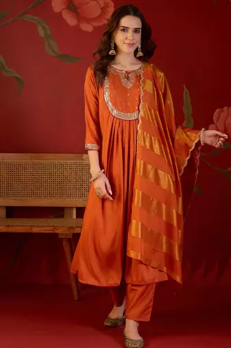 Orange cotton silk embroidered kurta set with dupatta.