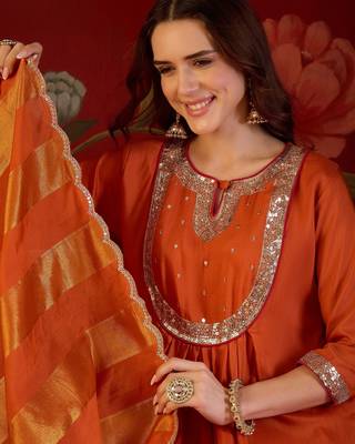 Orange cotton silk embroidered kurta set with dupatta. 3