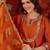 Orange cotton silk embroidered kurta set with dupatta.