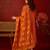 Orange cotton silk embroidered kurta set with dupatta.