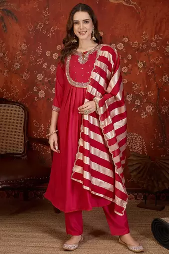 Rani cotton silk embroidered kurta set with dupatta.
