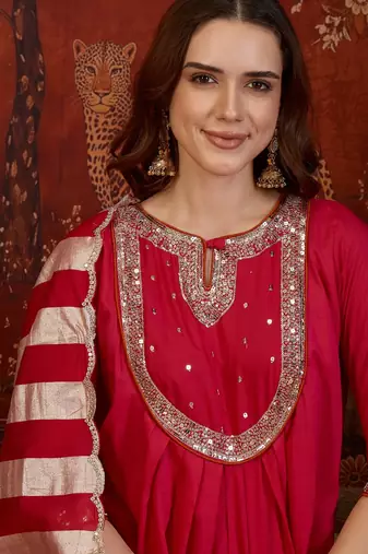 Rani cotton silk embroidered kurta set with dupatta.