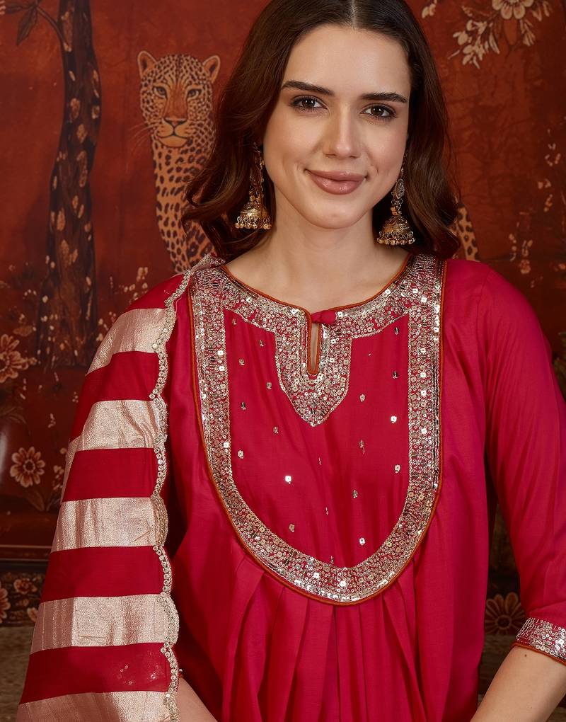 Rani cotton silk embroidered kurta set with dupatta.