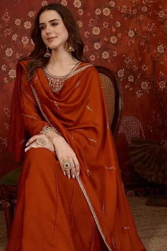 Orange silk blend embroidered anarkali kurta set with dupatta.
