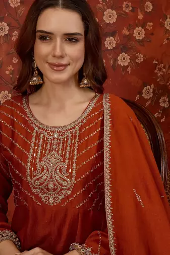 Orange silk blend embroidered anarkali kurta set with dupatta.