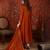 Orange silk blend embroidered anarkali kurta set with dupatta.