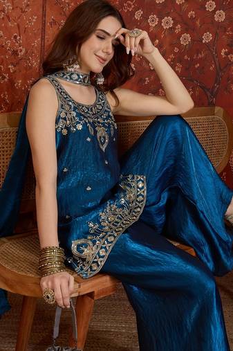 Teal tissue satin embroidered kurta sharara set with dupatta.