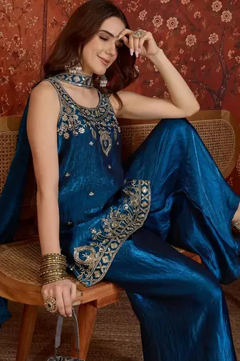 Teal tissue satin embroidered kurta sharara set with dupatta.