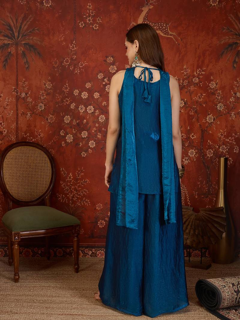 Teal tissue satin embroidered kurta sharara set with dupatta.