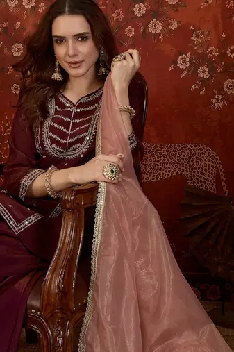 Maroon silk blend embroidered kurta sharara set with dupatta.