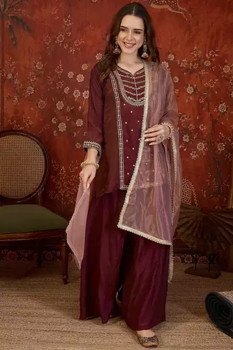 Maroon silk blend embroidered kurta sharara set with dupatta.