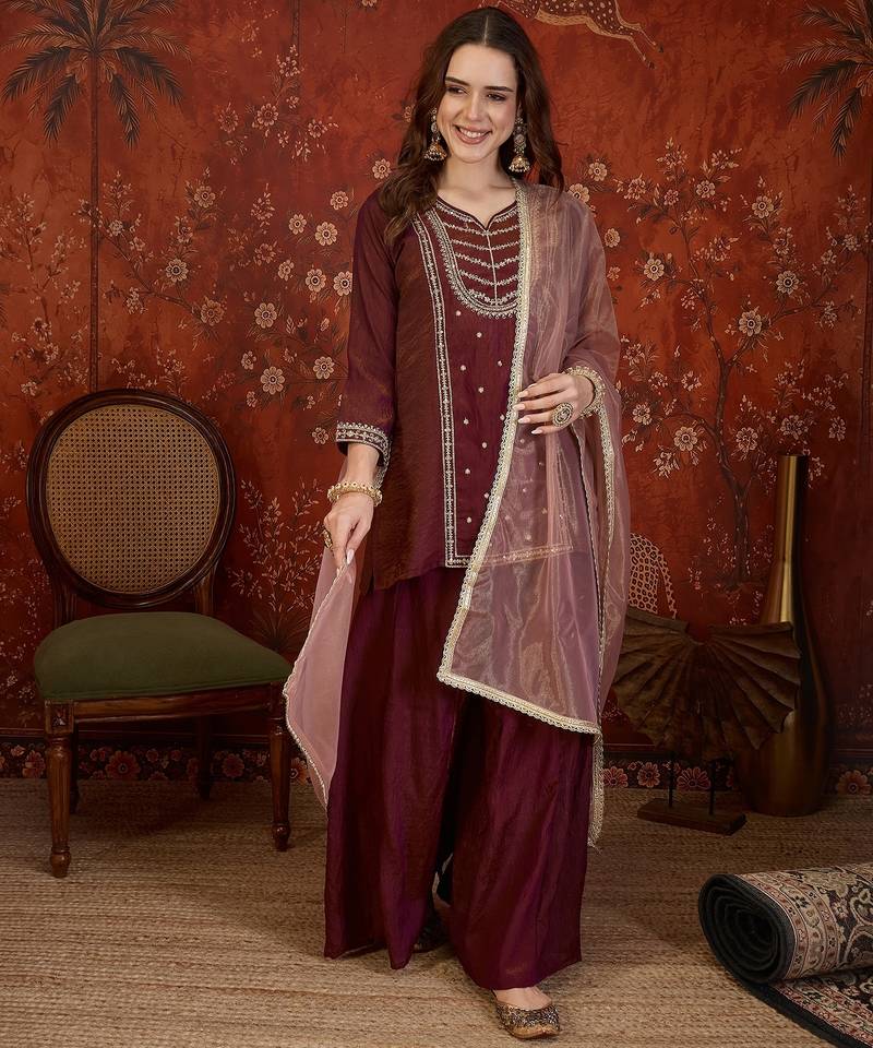 Maroon silk blend embroidered kurta sharara set with dupatta.