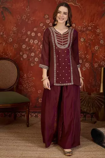 Maroon silk blend embroidered kurta sharara set with dupatta.