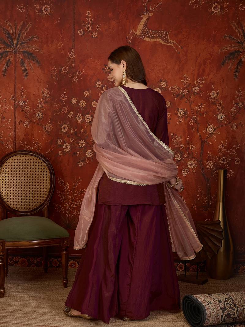 Maroon silk blend embroidered kurta sharara set with dupatta.