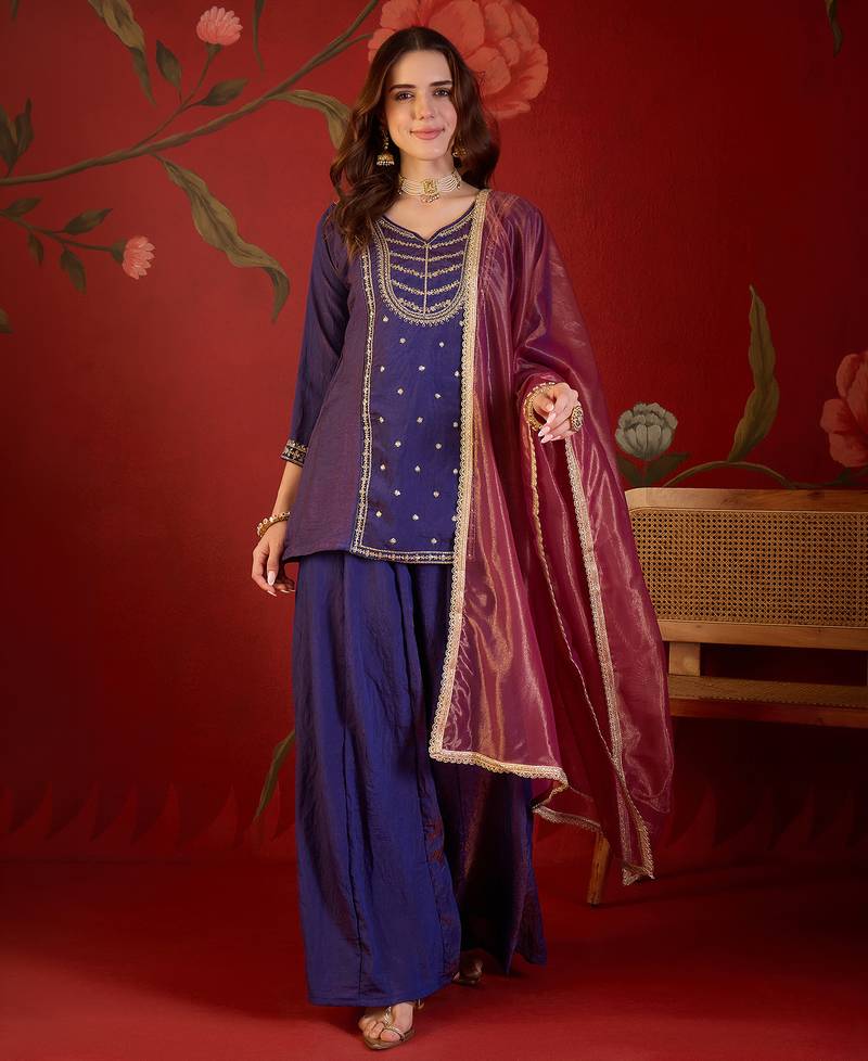 Purple silk blend embroidered kurta sharara set with dupatta.