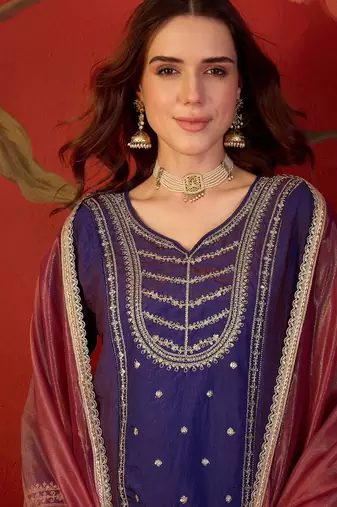 Purple silk blend embroidered kurta sharara set with dupatta.
