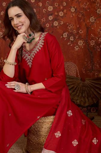 Red silk blend embroidered kurta set with dupatta.