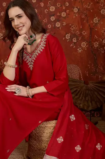 Red silk blend embroidered kurta set with dupatta.