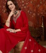 Red silk blend embroidered kurta set with dupatta.