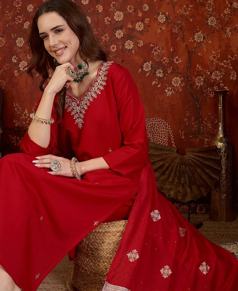 Red silk blend embroidered kurta set with dupatta.