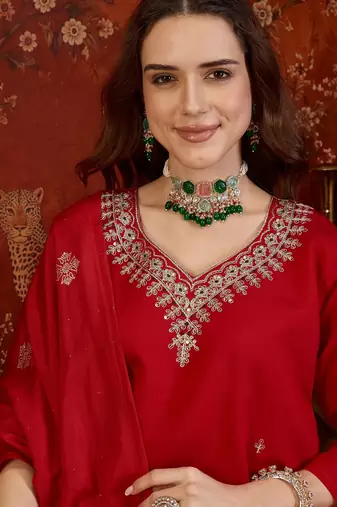 Red silk blend embroidered kurta set with dupatta.