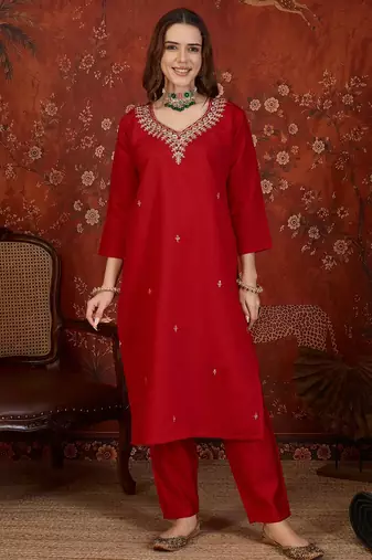 Red silk blend embroidered kurta set with dupatta.