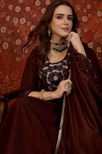Maroon silk blend embroidered kurta set with dupatta.