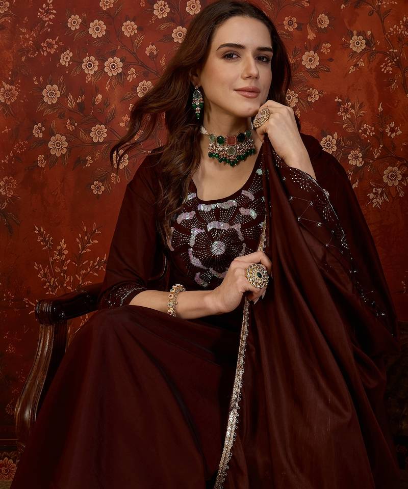 Maroon silk blend embroidered kurta set with dupatta.