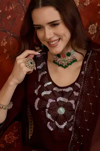 Maroon silk blend embroidered kurta set with dupatta.