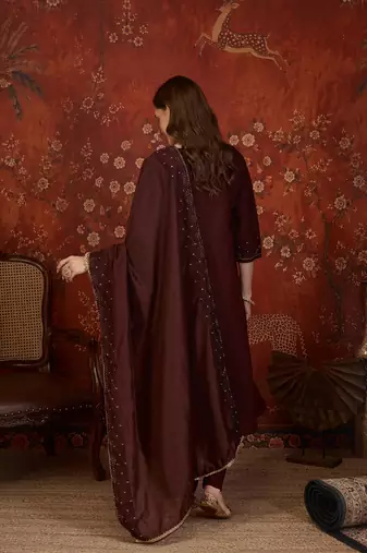 Maroon silk blend embroidered kurta set with dupatta.