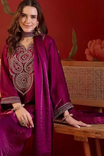 Rani tissue satin embroidered kurta sharara set with dupatta.
