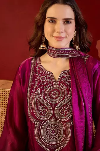 Rani tissue satin embroidered kurta sharara set with dupatta.