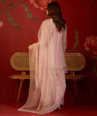 Peach organza embroidered kurta plazzo set with dupatta. 5