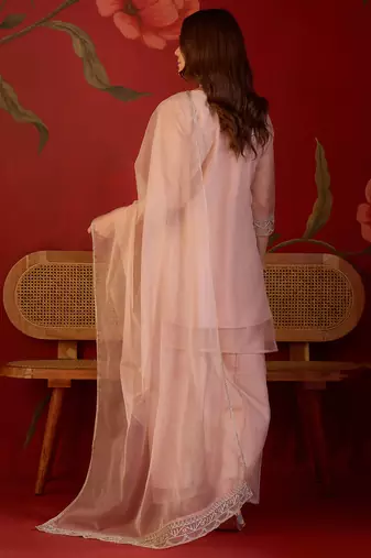Peach organza embroidered kurta plazzo set with dupatta.