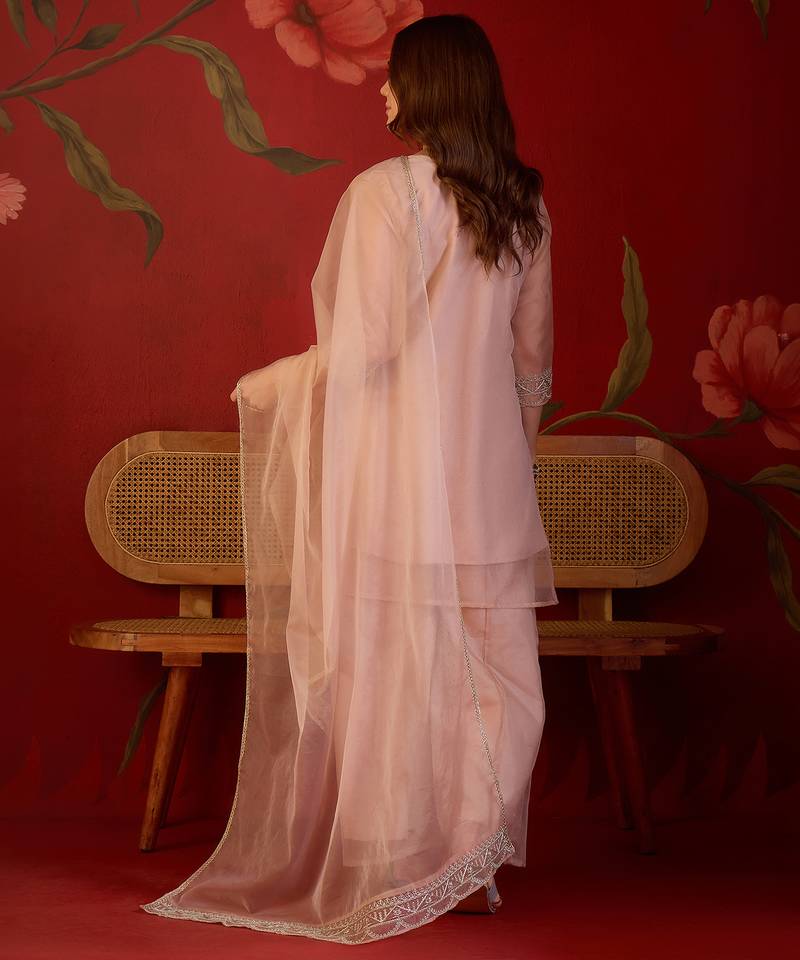 Peach organza embroidered kurta plazzo set with dupatta.