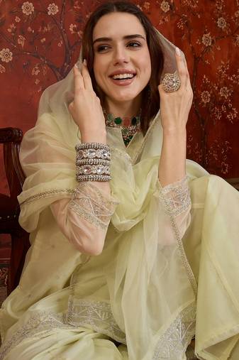 Pista organza embroidered kurta plazzo set with dupatta.