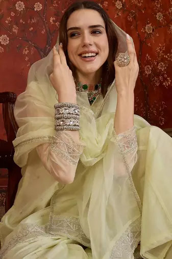 Pista organza embroidered kurta plazzo set with dupatta.