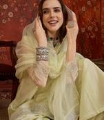 Pista organza embroidered kurta plazzo set with dupatta.
