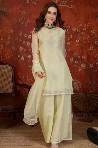 Pista organza embroidered kurta plazzo set with dupatta.