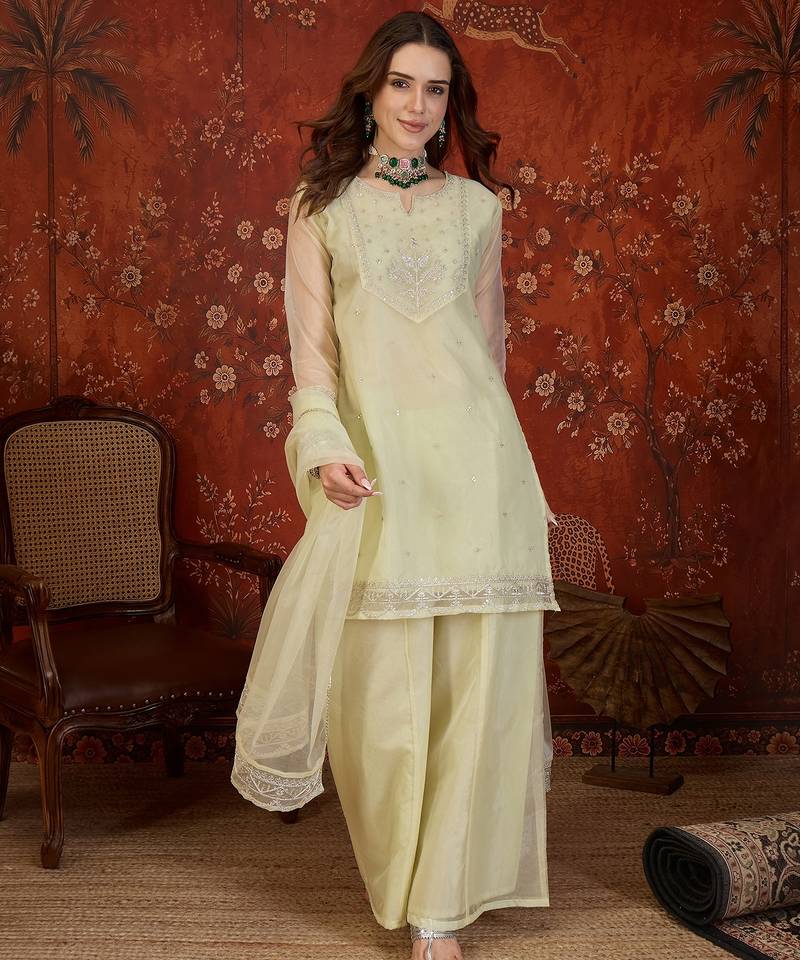 Pista organza embroidered kurta plazzo set with dupatta.