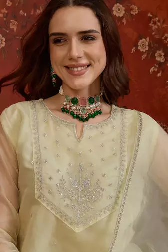 Pista organza embroidered kurta plazzo set with dupatta.