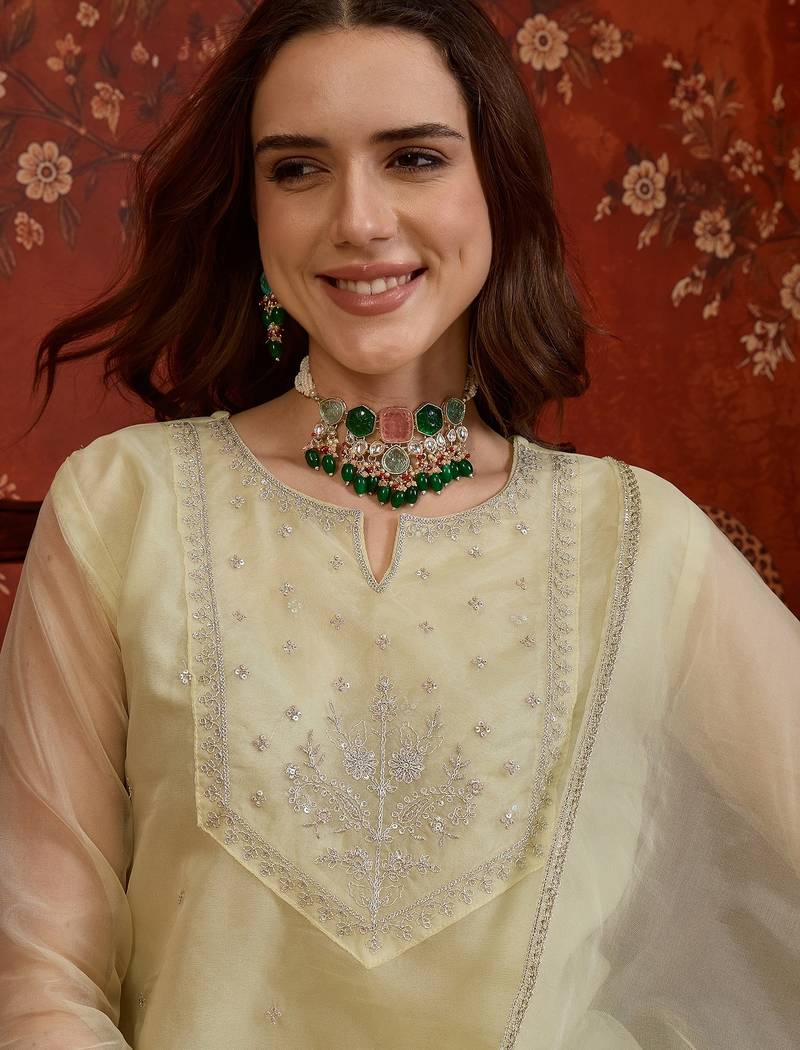 Pista organza embroidered kurta plazzo set with dupatta.