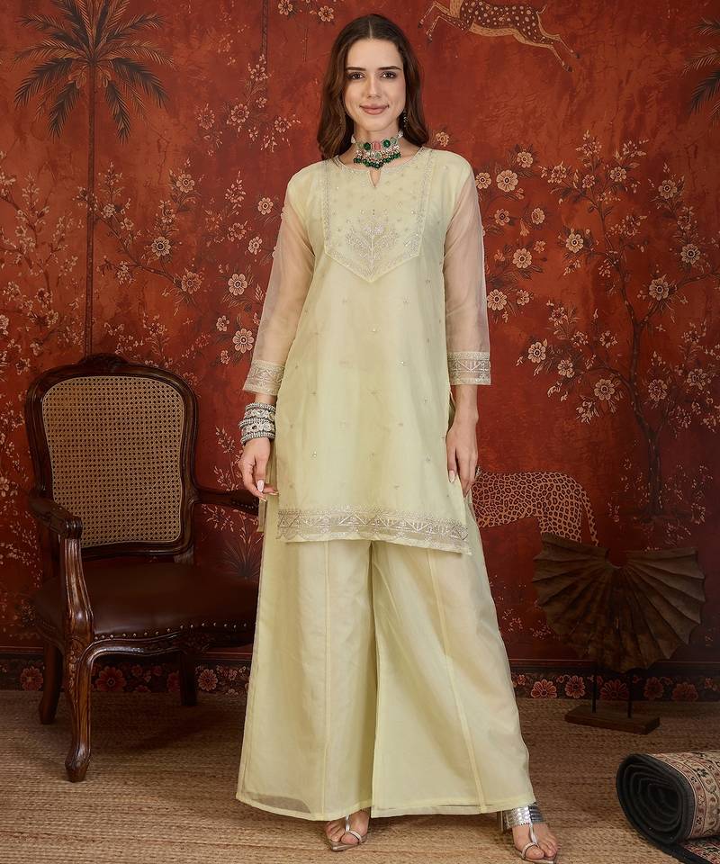 Pista organza embroidered kurta plazzo set with dupatta.