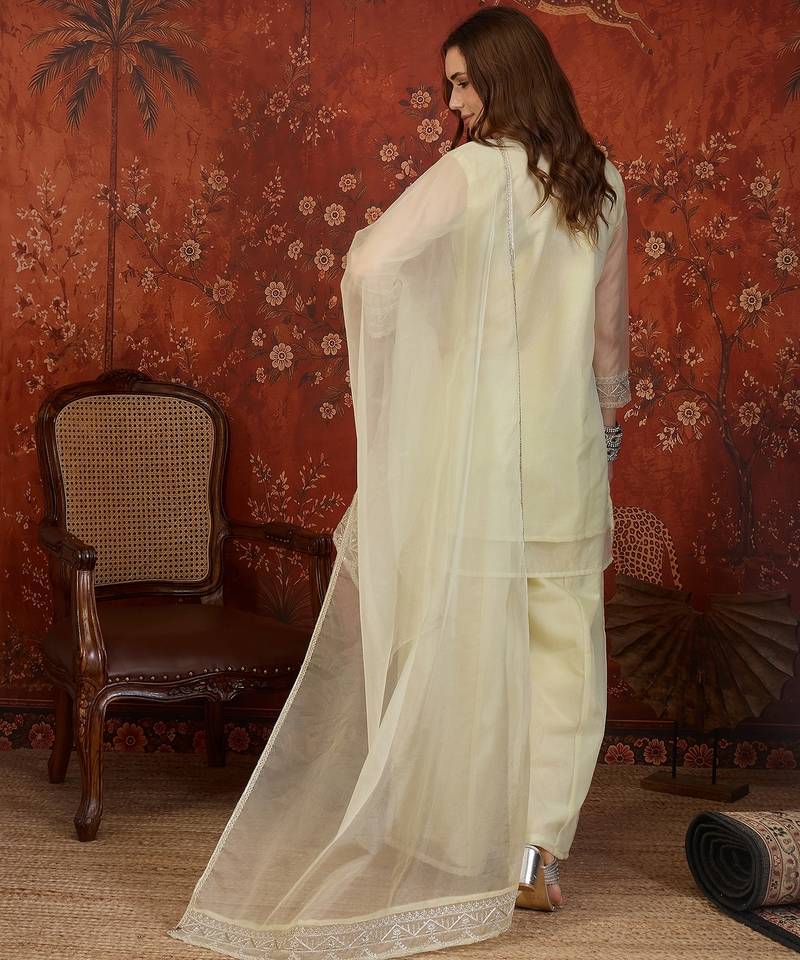 Pista organza embroidered kurta plazzo set with dupatta.