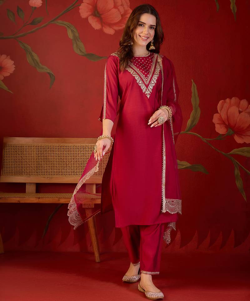 Rani silk blend embroidered kurta set with dupatta.
