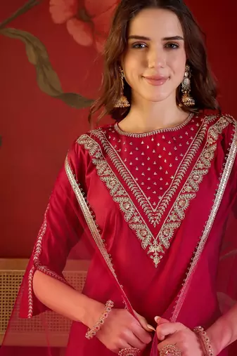 Rani silk blend embroidered kurta set with dupatta.