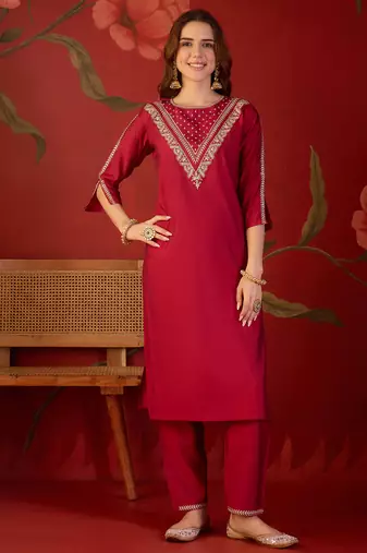 Rani silk blend embroidered kurta set with dupatta.
