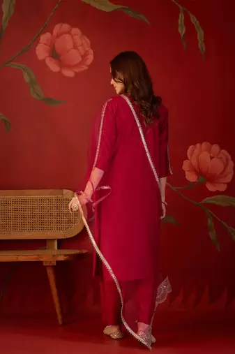 Rani silk blend embroidered kurta set with dupatta.